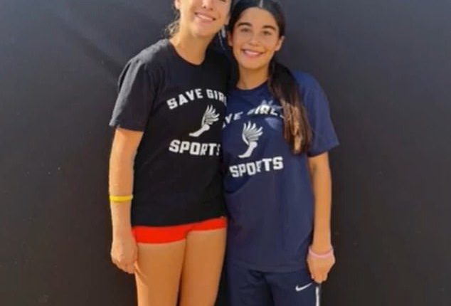 Taylor Sterling (left) with fellow student Kaitlyn Slavin (right). Both girls found themselves involved in a transgender row at their California high school after Taylor lost her spot on the the varsity cross country team.