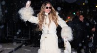 Sydney Sweeney, 27, laughs with fiancé Jonathan Davino, 41, in snowy New York as she steps out in white feathered coat