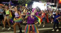 Not all mass produced fashions adopted from the United States, that saturate many aspects of Australian life, are worth keeping including 'diversity, equity and inclusion' (pictured are revellers at Sydney's 2023 Gay and Lesbian Mardi Gras)