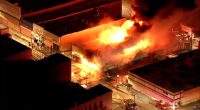 CFD battles large fire at South Side furniture store; firefighter injured