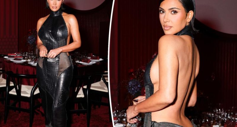 Kim Kardashian shows some skin in dangerously low-backed gown at red carpet gala