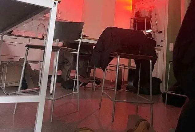 An image believed to have been taken inside the school and published by Swedish press showed a person lying on the floor of a classroom beside overturned chairs