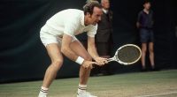 Fred Stolle (pictured playing in 1971) was a giant of Aussie tennis as both a player and the voice of the sport through his TV work