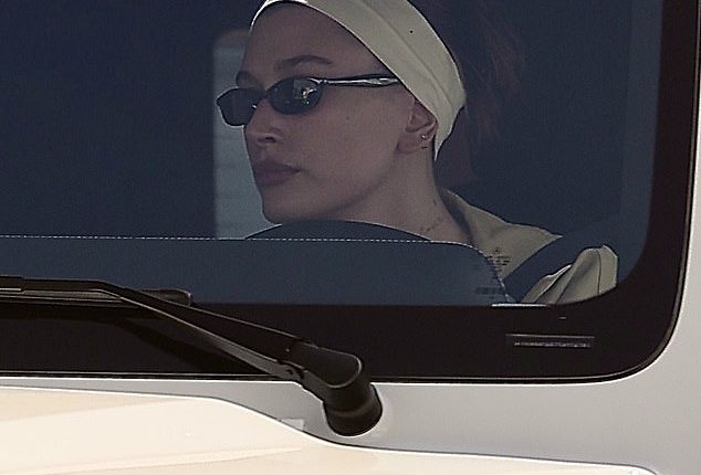 Hailey Bieber was spotted getting some time to herself behind the wheel of her new SUV following her morning workout on Sunday after her husband Justin Bieber shared a shockingly disrespectful post on Instagram.