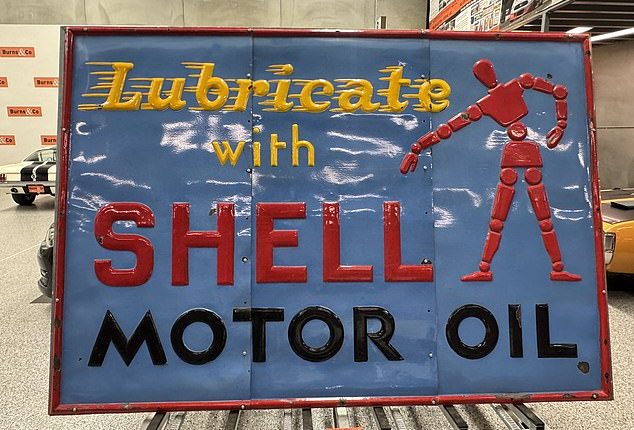A 100-year-old blue enamel Shell sign (pictured) sold for $133,975 at auction last Thursday