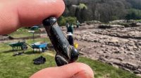 According to experts, the object's smooth surface suggests the owner touched it often for good luck