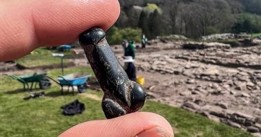 According to experts, the object's smooth surface suggests the owner touched it often for good luck