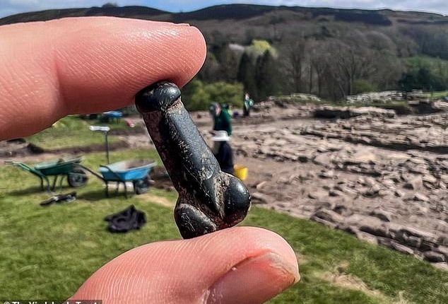 According to experts, the object's smooth surface suggests the owner touched it often for good luck