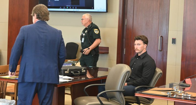 Jaydeon Jackeon, right, with his attorney, Josh Davis, during today