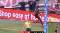 'Distraught' grandfather of a young footy fan who allegedly threw a banner at a Port Adelaide star delivers emotional interview on live radio