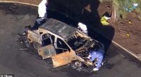 Fire crews discovered a body inside a burnt out car in Sydney's south-west on Thursday night