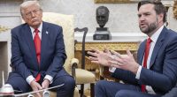 US Vice President JD Vance answers reporters' questions next to US President Donald Trump