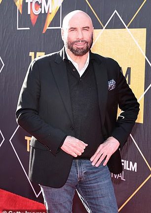 John Travolta, 71, reassured his fans after sharing a sweet Easter photo featuring his dog Peanut and a chocolate Easter bunny;  Pictured in Los Angeles in April 2024