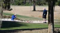 Trying to dig out of the Palm Harbor Golf Club money pit. (© FlaglerLive)