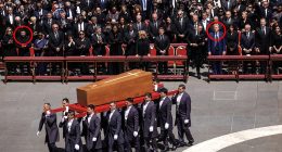 Donald Trump and Volodymyr Zelensky sat eleven spaces apart, after the Vatican overturned tradition to put the Ukranian premier on the front row