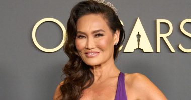 90s hottie Tia Carrere, 58, looks half her age in a plunging violet gown more than 30 years after Wayne’s World fame