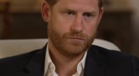 Body language expert Judi James told FEMAIL that Prince Harry's stare 'suggested a man who¿d found more toys to throw out of the pram'