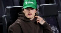 Cruz Beckham supports mum Victoria after Brooklyn seeks comfort with her former friend Meghan Markle amid feud
