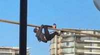 A man seen climbing the mooring lines of a cruise ship on Sydney Harbour has been arrested