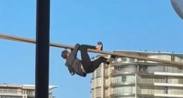 A man seen climbing the mooring lines of a cruise ship on Sydney Harbour has been arrested