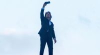 Daring Tom Cruise, 62, in latest risky stunt as he scales roof of UK cinema for selfie to promote new film
