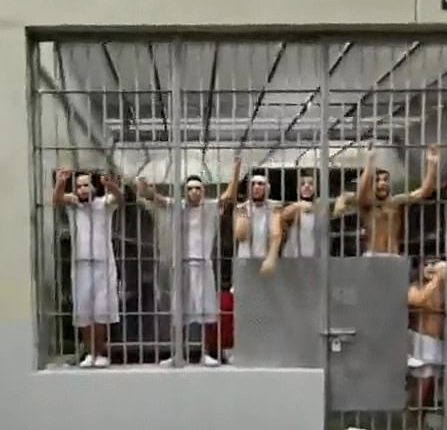Deported 'Tren de Aragua gangsters' scream in distress in first video from inside El Salvador prison