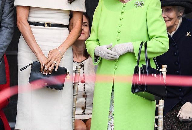 Meghan compared the 'surreal' encounter with the Queen to a night out at US restaurant Medieval Times. She is pictured with the Queen in 2018