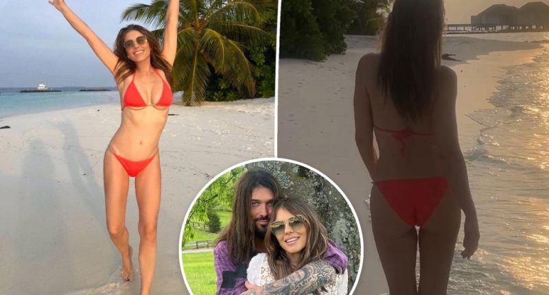 Elizabeth Hurley frolics in red bikini, reflects on ‘helluva few weeks’ after debuting Billy Ray Cyrus romance