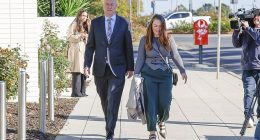 Simon Patterson and his media representative Jessica O'Donnell enter the Latroba Valley law courts on Friday