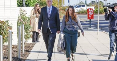 Simon Patterson and his media representative Jessica O'Donnell enter the Latroba Valley law courts on Friday