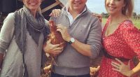 Tom (centre) and Emma Lane (left) bought a a six-bedroom, six-bathroom in Clontarf