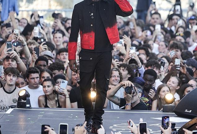 French rapper Werenoi (pictured in July 2024) has reportedly died of a cardiac arrest at the age of 31 just hours before he was due on stage