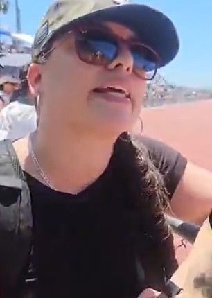 The mother of a trans high school athlete has been confronted by her fellow parents