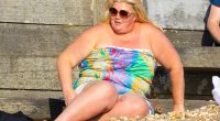 Gemma Collins soaks up the sun on the beach in strapless dress after revealing weight loss jabs had transformed her life
