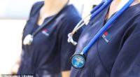 The company employs about 19,000 in Australia (above, a stock of NSW Health nurses)