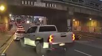 Dramatic dashcam showed the white Toyota HiLux crossing the median strip after the vehicle was shot at seven times along Woodville Road in Granville