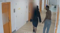 Ashirie Smith (right), 19, and Thierry Robinson (left), 21, are seen walking down the corridor before entering the cell belonging to Mahir Abdulrahman, 31