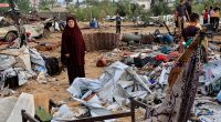 Israel has expanded its strikes on the enclave, killing hundreds of people since Thursday, in preparation for a new ground offensive to achieve 'operational control' in parts of Gaza. Pictured: Palestinians inspect the damage of after a strike in Khan Younis, Gaza Strip