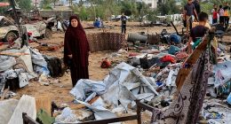 Israel has expanded its strikes on the enclave, killing hundreds of people since Thursday, in preparation for a new ground offensive to achieve 'operational control' in parts of Gaza. Pictured: Palestinians inspect the damage of after a strike in Khan Younis, Gaza Strip