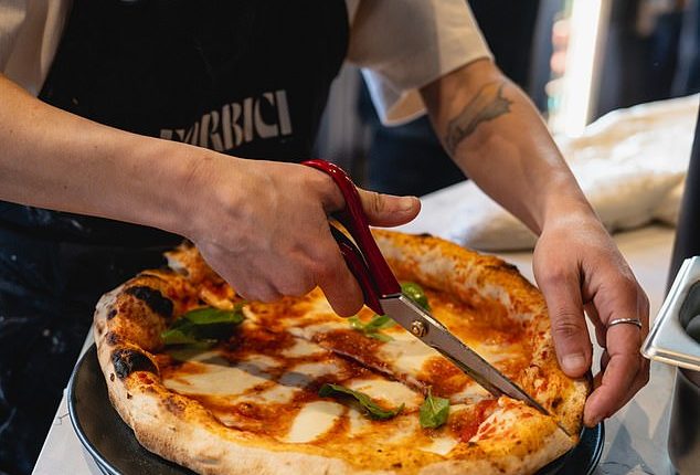 Davide Argentino, who previously won the 'best pizza dough in the world' accolade, says you wouldn't catch anyone in Naples using a pizza cutter