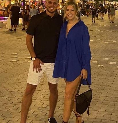 Alex Gray (pictured with his girlfriend), who posted the clip on TikTok , revealed he had walked away from the Leeds-based groundworks firm and accepted 'full responsibility'