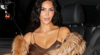 Kim Kardashian, 44, wows in tiny dress as she enjoys meal out in Paris after giving evidence at gem raid trial