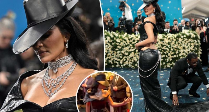Kim Kardashian appears agitated after security guard trips over her Met Gala 2025 gown
