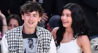 Kylie Jenner and Timothee Chalamet share a steamy kiss as they sit courtside at LA Lakers game