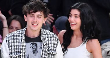 Kylie Jenner and Timothee Chalamet share a steamy kiss as they sit courtside at LA Lakers game