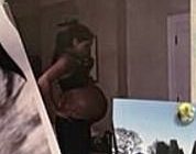 Meghan's image of her pregnancy bump has come under fire, with trolls claiming the bare bump is too ¿shiny¿, ¿far too high¿, ¿transparent¿ and even suggesting you can ¿see the straps¿ of a prosthetic belly