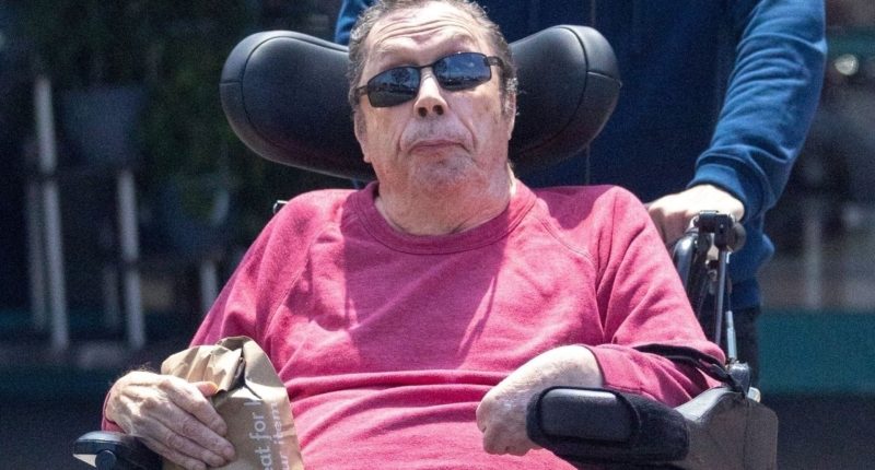 Legendary Brit actor Tim Curry seen on rare outing with his carer 13 years after Rocky Horror star suffered a stroke