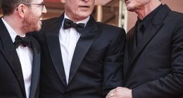A lip reader has explained what Pedro Pascal told Joaquin Phoenix after he pulled down the actor's waving hand while on the red carpet of the Cannes Film Festival