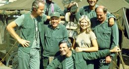 Loretta Swit pictured above surrounded by her  M*A*S*H* cast members, from left: Mike Farrell, William Christopher, Harry Morgan, Alan Alda, Jamie Farr, and David Ogden Stiers