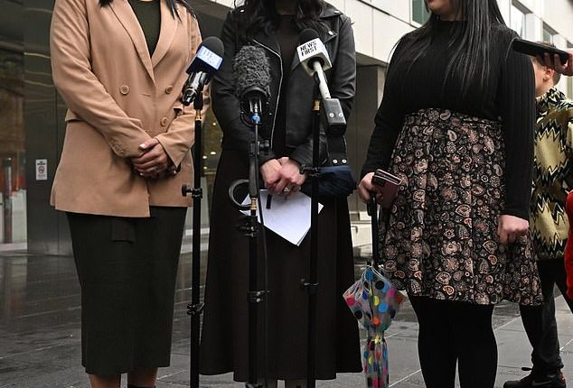 Sisters Elly Sapper, Nicole Meyer and Dassi Erlich are seen reading statements about the impact of Malka Leifer's offending outside Victoria's County Court in June, 2023